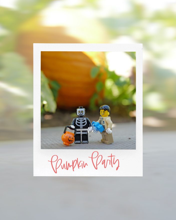 A Polaroid-style photo shows two LEGO minifigures in Halloween costumes—one as a skeleton holding a pumpkin bucket, the other as a doctor. A large pumpkin is in the background. Pumpkin Party is written on the photo.