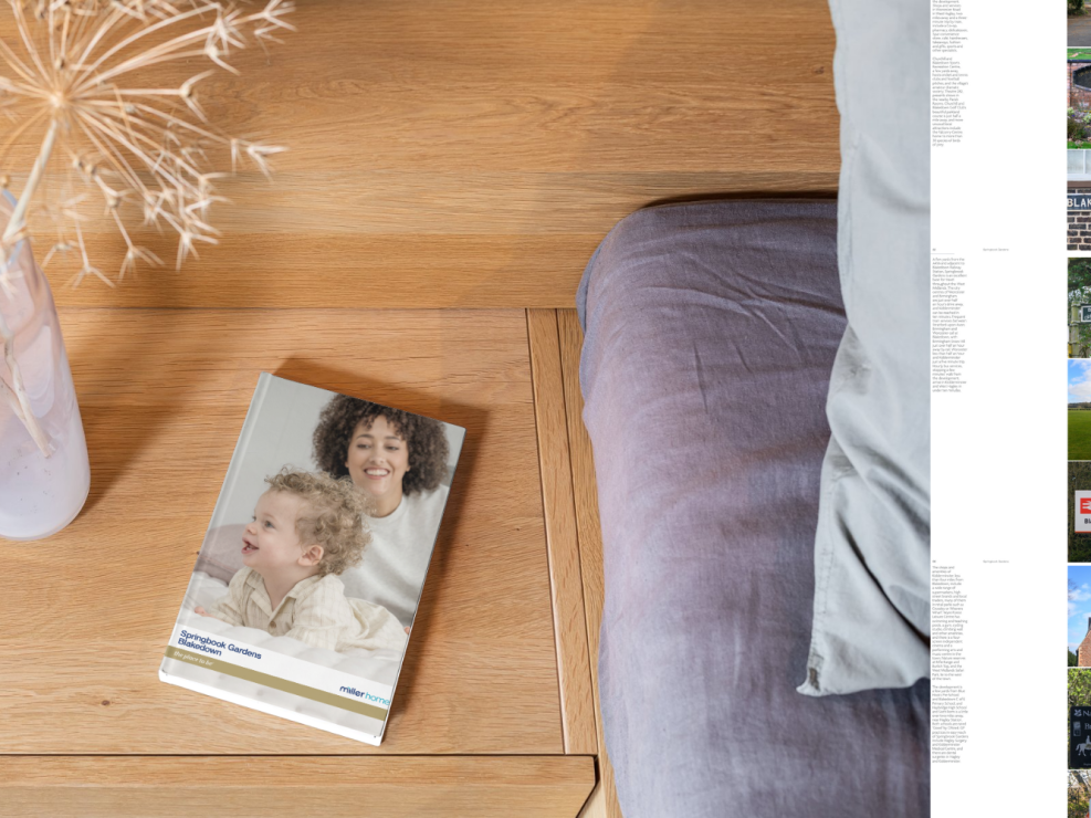 A beige wooden table with a vase of dried flowers, a book featuring a smiling woman and child on the cover, and a grey cushion; to the right, a vertical strip shows a collage of various outdoor photos.