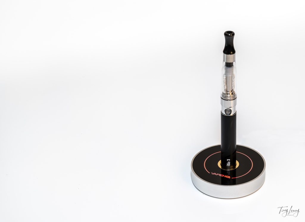 Vape on the right hand side, showing the white negative space on the left.