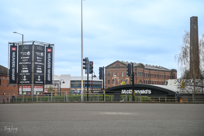 View of the Weavers Wharf retail park in Kidderminster showing the sign of shops