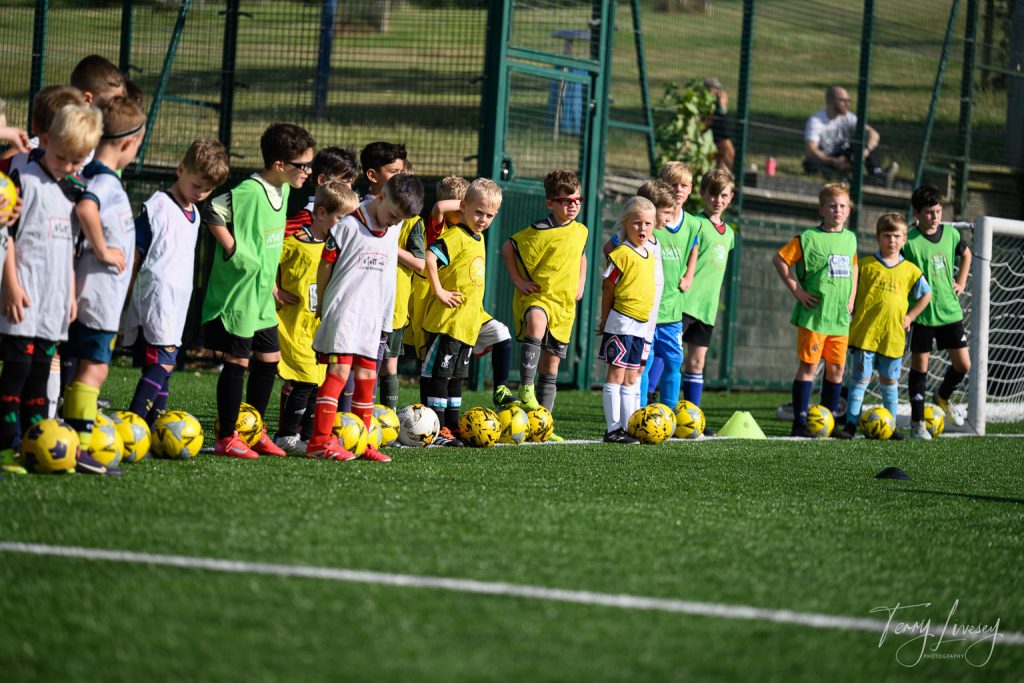 Photographs of football students on the pitch of Matt Tally Player Development.