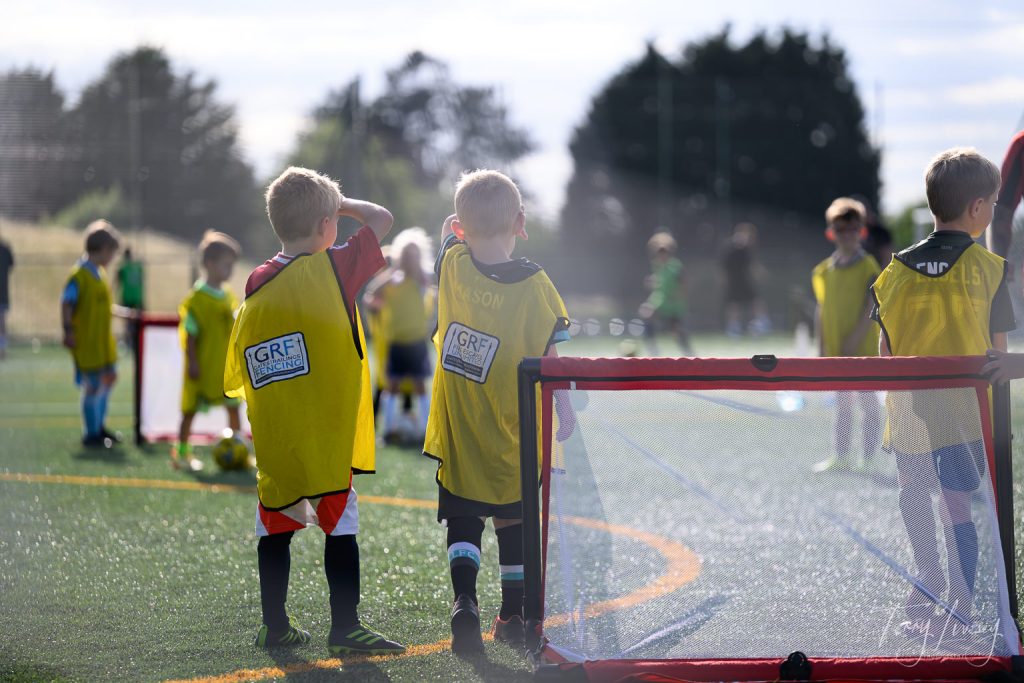 Photographs of football students on the pitch of Matt Tally Player Development.