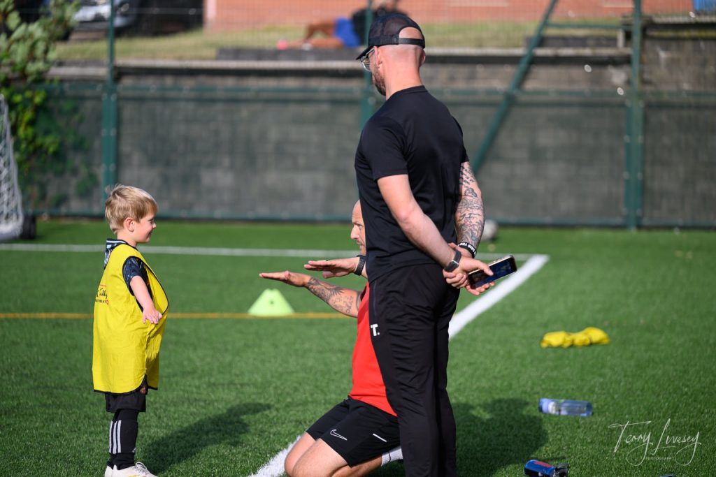 Photographs of football students on the pitch of Matt Tally Player Development.