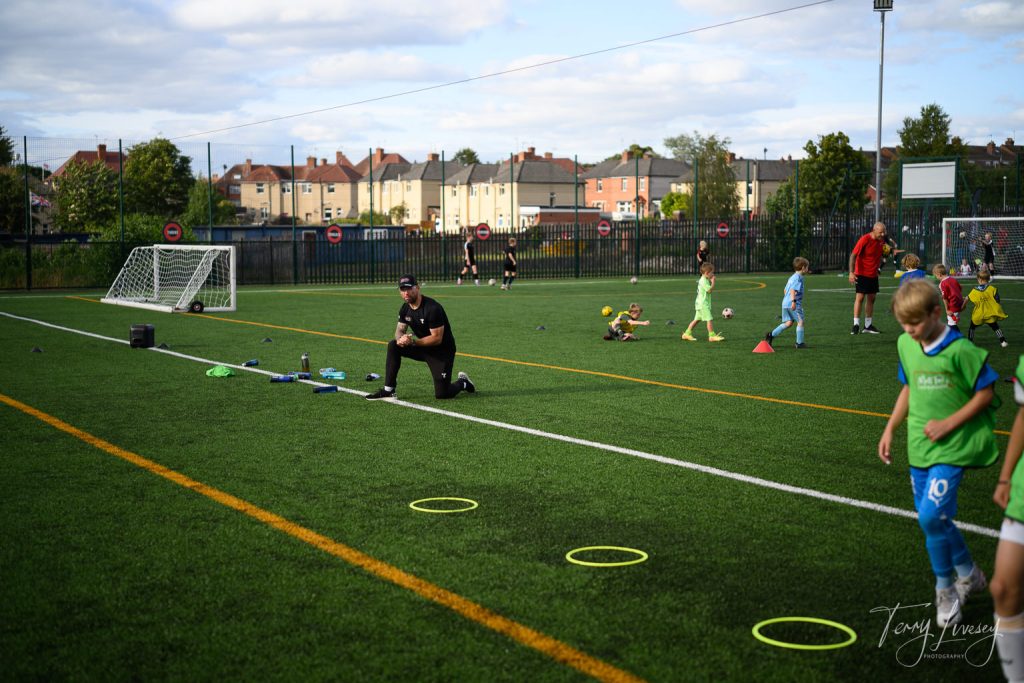 Photographs of football students on the pitch of Matt Tally Player Development.