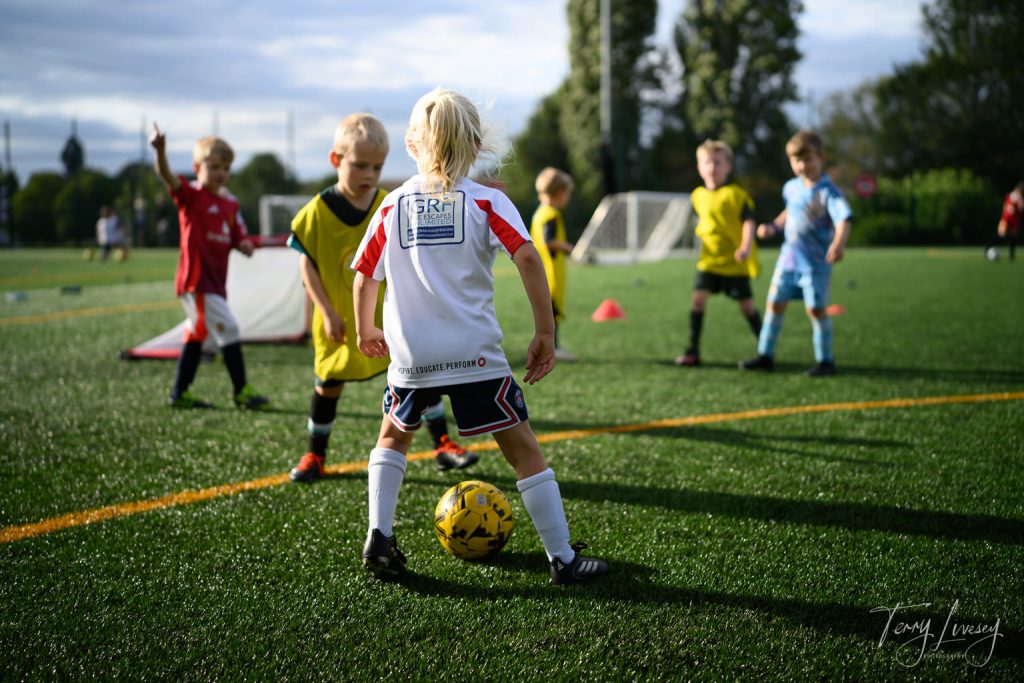 Photographs of football students on the pitch of Matt Tally Player Development.