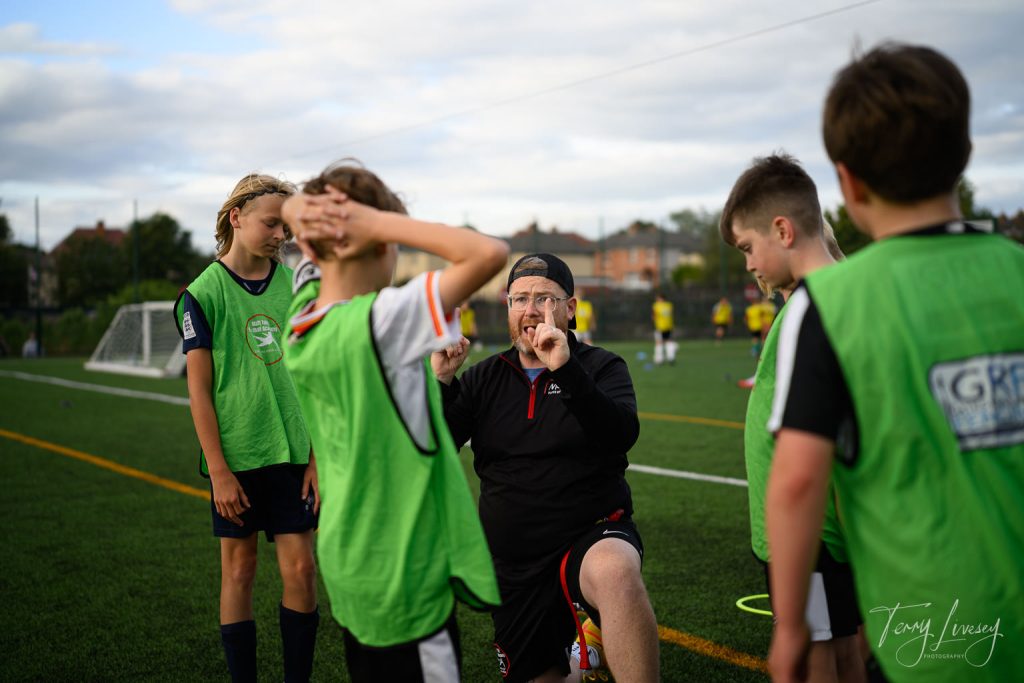 Photographs of football students on the pitch of Matt Tally Player Development.