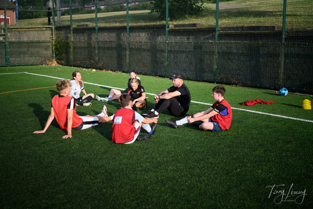 Photographs of football students on the pitch of Matt Tally Player Development.