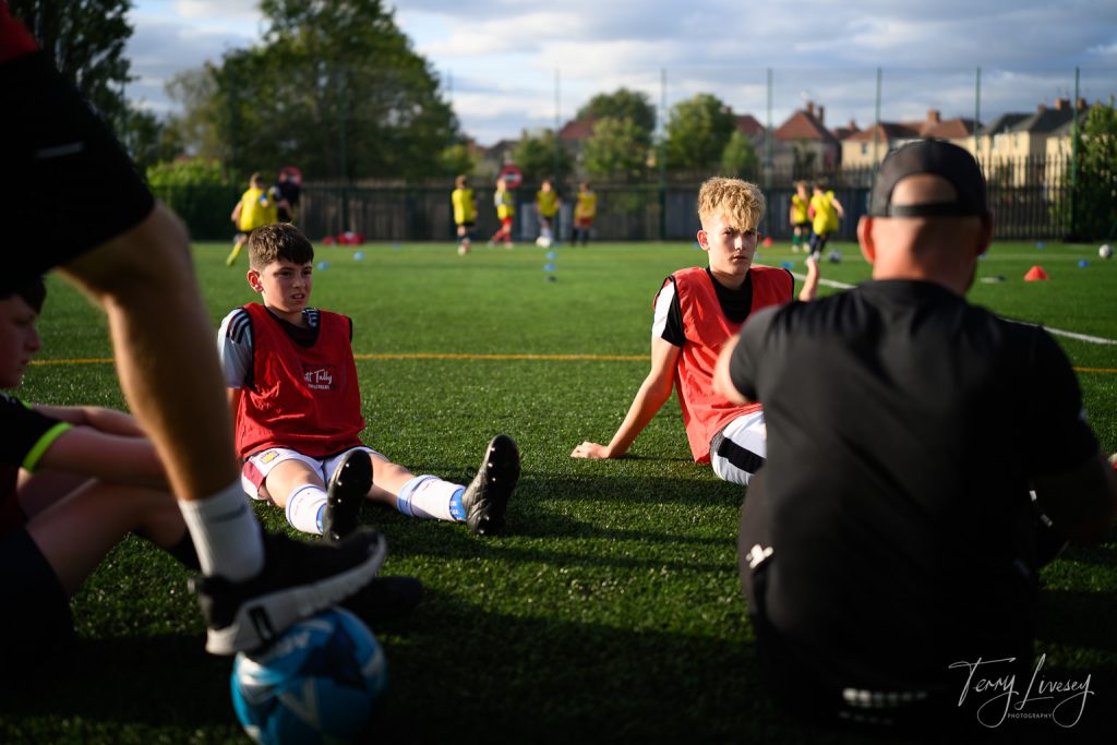 Photographs of football students on the pitch of Matt Tally Player Development.